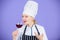Which wine to serve with dinner. How to pair wine and food like expert. Girl wear hat and apron enjoy aroma of drink