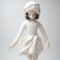 Whimsical Doll In Akira Toriyama Style: Vibrant Monochromatic Knitted Dress