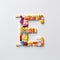 Whimsical Pill Art: Vibrant Letter E Made With Colorful Pills