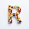 Whimsical Pill Letter R: Detailed Shapes And Vibrant Colors