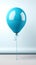 Whimsical solitude solitary blue balloon symbolizes joy against a white backdrop