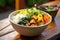 a whimsically decorated rice bowl with veggies and tofu