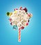 Whipped chantilly cream lolipop concept. Round whipped milk shake cream like lollipop with candy, sweets and candy on