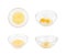 Whisked eggs in a glass bowl isolated