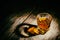 whiskey with ice cubes on wooden background