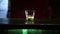 Whiskey with ice on a wooden table. HD shot with slider