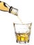 Whiskey pouring in glass, clipping path