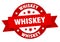 whiskey round ribbon isolated label. whiskey sign.