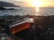 Whisky in flat Bottles on rock beach