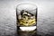 Whisky on the rocks in a glass tumbler