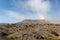 Whispering sands background with Bromo Volcano