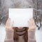 Whispers in Winter: Woman Conceals Secrets Behind Snowy Silence