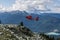 WHISTLER, CANADA - AUGUST 25, 2019: red helicopter on Blackcomb mountain for air lookup tour