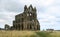 Whitby Abbey - ruins of gothic church above sea shore in England