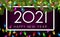 White 2021 sign on lilac background