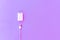 White Ñable phone chargers on pink background. Top view. Objects on a simple background