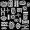 White African motifs set over black background