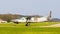 White airplane driving by in closeup, aircraft on the airport, air transportation