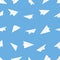 White airplanes on pattern layout. Seamless mockup of with paper planes aircraft on blue background