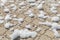 White airy foam on a paving slabs