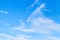 White altocumulus clouds in blue sky