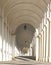 White arcades of a staircase that leads to a Catholic sanctuary