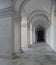 White archway colonnade in courtyard of Convento de Nossa Senhora da Graca, Lisbon, Portugal.