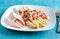 White asparagus with tomatoes and ham