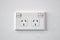 A white Australian wall power outlet.