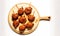 On a white background, a board with delectable chicken lollipops is displayed