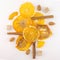 A white background in a cozy style. Slices of dried orange, persimmons and almonds. Flat lay