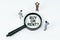 On a white background, figures of businessmen and a magnifying glass with the inscription - BUY OR RENT