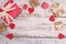 White background made of wood with red heart, gifts Valentine`s Day