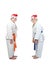 On a white background two athletes in caps of Santa Claus doing bow