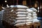 White bag rice or grits storage barn, Close-up of a warehouse with bulk