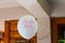 White balloon with a pink Bride to Be sign for a bridal shower