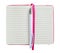 White ballpoint pen on the opened notebook with lined paper in a pink cover isolated on a white background copy space