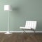 White barcelona chair and lamp on