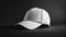 A white baseball cap mock up placed on a clean black background. Suitable for various marketing and promotional materials