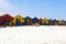 White beach in front of colorful beach huts, wide beach with white sand, Kalk Bay South Africa