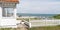 White beach house front of arcachon Bassin in cap ferret in France in web banner template