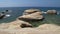 White beach. Mediterranean Sea. Sea landscape of Cyprus with a rocky shore.