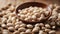 White beans in a spoon on a wooden background.