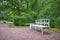 White beautiful bench in a summer Park