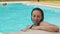 White beautiful woman portrait with private pool water