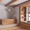 White and beige farmhouse bathroom with wooden bathtub. Window with bench and pillows, plaster concrete walls. Japandi interior