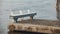 White Bench on the end of a Pier