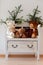White bench with teddy bears and christmas sprig