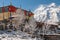 White Bhuddist stupa in snow in Himalayas