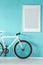 White bicycle in blue anteroom